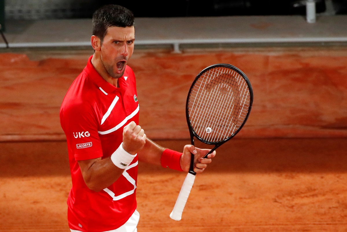 Serbia's Novak Djokovic celebrates winning a point during his fourth round match against Russia's Karen Khachanov at the French Open on Monday.