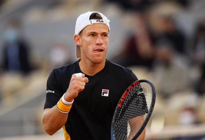 Diego Schwartzman exults after winning a point