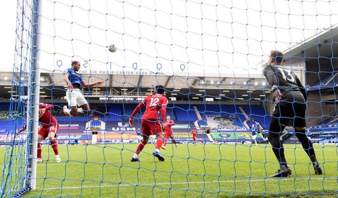 Dominic Calvert-Lewin scores Everton's second goal during the Premier League match against Liverpool