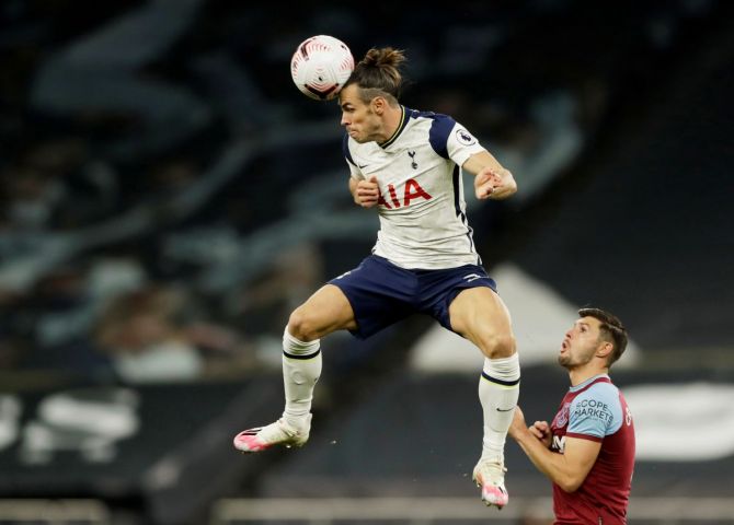 Tottenham Hotspur's Gareth Bale in action with West Ham United's Aaron Cresswell Pool during their Premier League match at Tottenham Hotspur Stadium, London, Britain, on Sunday