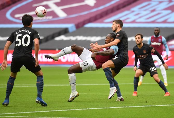 Michail Antonio puts West Ham United ahead during the Premier League match against Manchester City