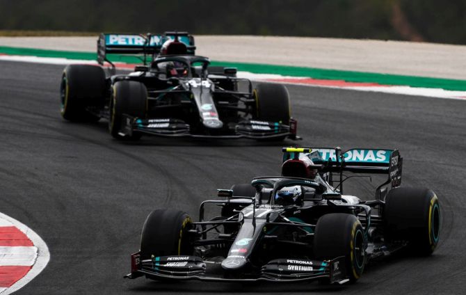 Mercedes' Valtteri Bottas leads teammate Lewis Hamilton on track during the F1 Grand Prix of Portugal at Autodromo Internacional do Algarve in Portimao