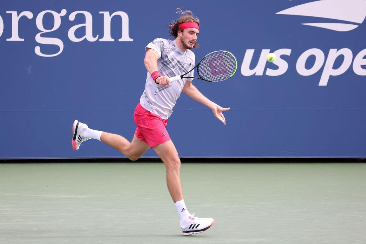 Greece's Stefanos Tsitsipas plays a return during his first round match against Spain's Albert Ramos-Vinolas