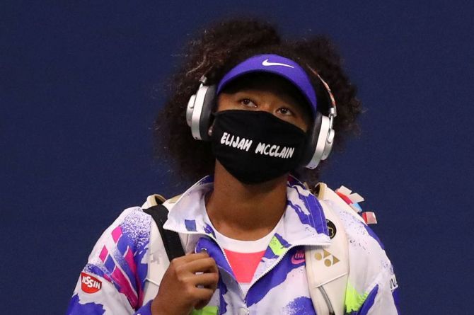 Japan's Naomi Osaka wears a mask with the name Elijah McClain on it following her second round win against Italy's Camila Giorgi on Wednesday. McClain, 23, died after a violent encounter with police officers in with Aurora, Colorado in August last year.