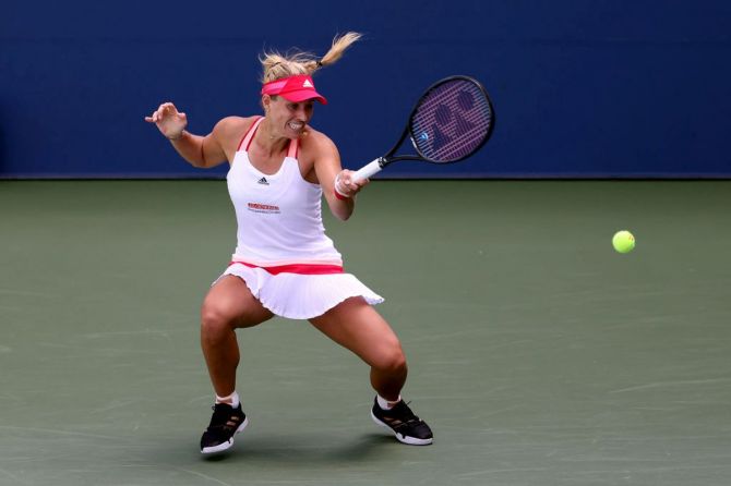 Germany's Angelique Kerber plays a return during third round match against USA's Ann Li. 