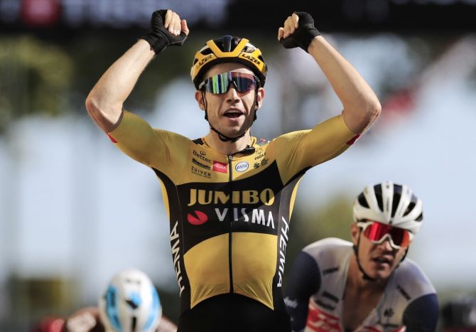 Team Jumbo-Visma's Belgian rider Wout Van Aert wins the 7th stage from Millau to Lavaur, France on Friday