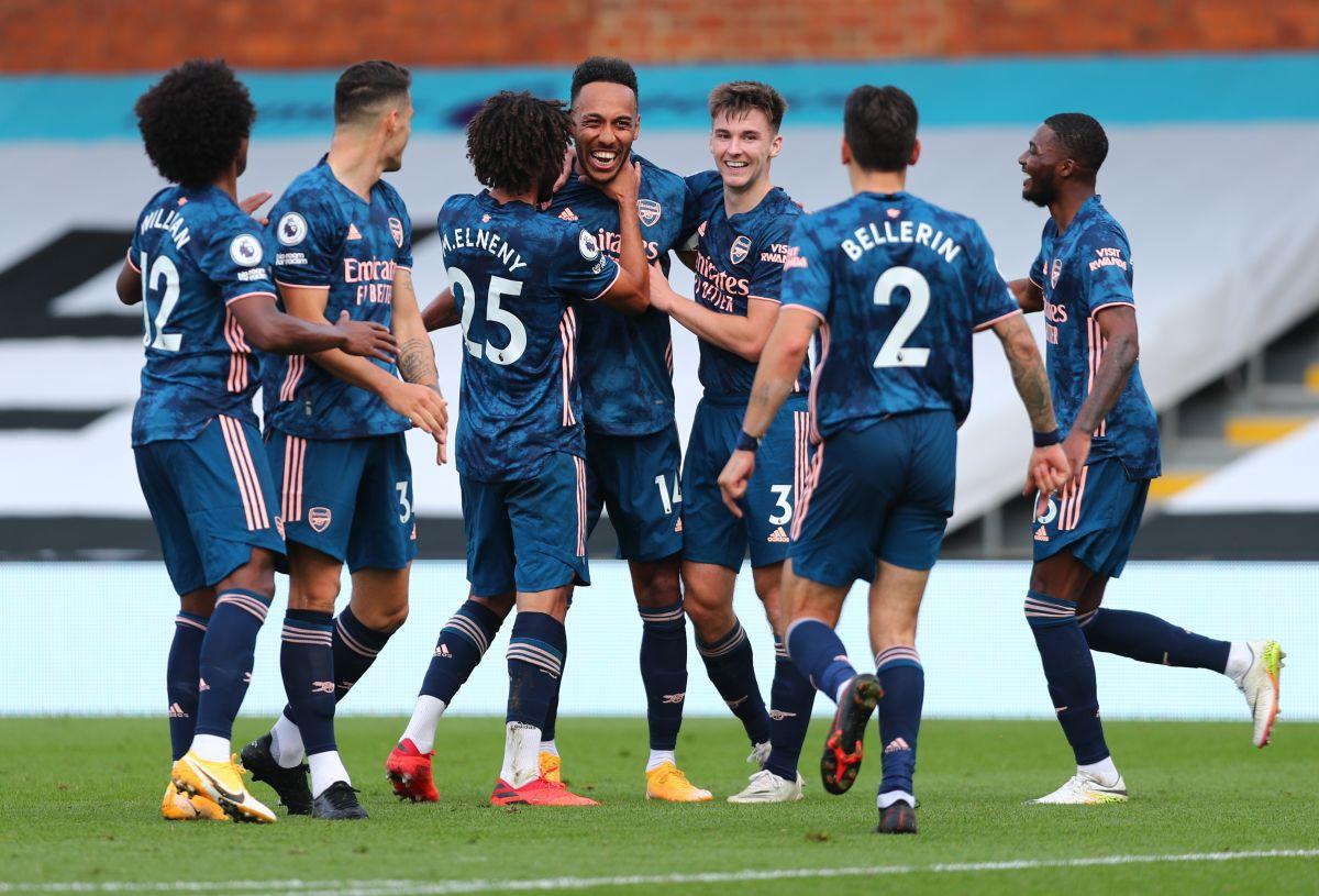 Arsenal's Pierre-Emerick Aubameyang celebrates with teammates after scoring their third goal