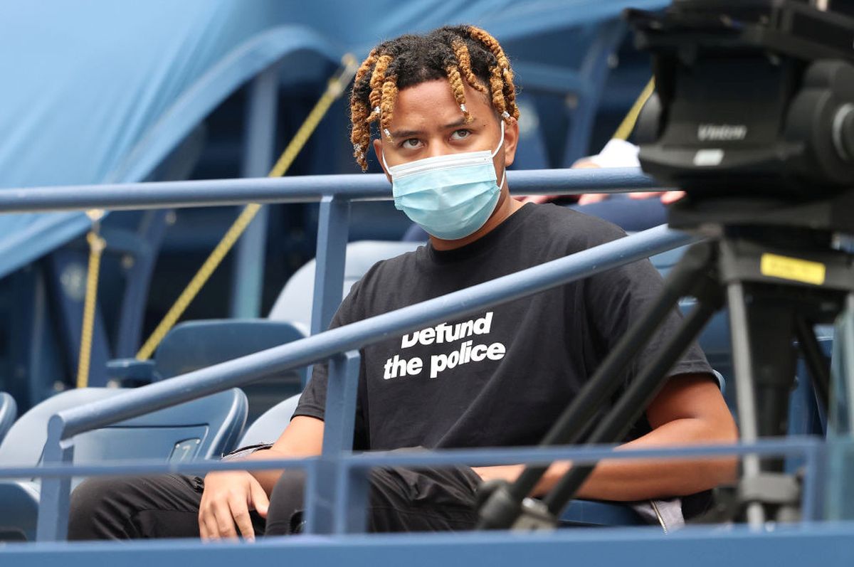 Naomi Osaka's boyfriend, rapper YBN Cordae looks on before the US Open final on Saturday