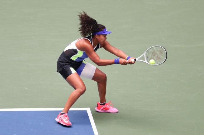 Naomi Osaka plays a return