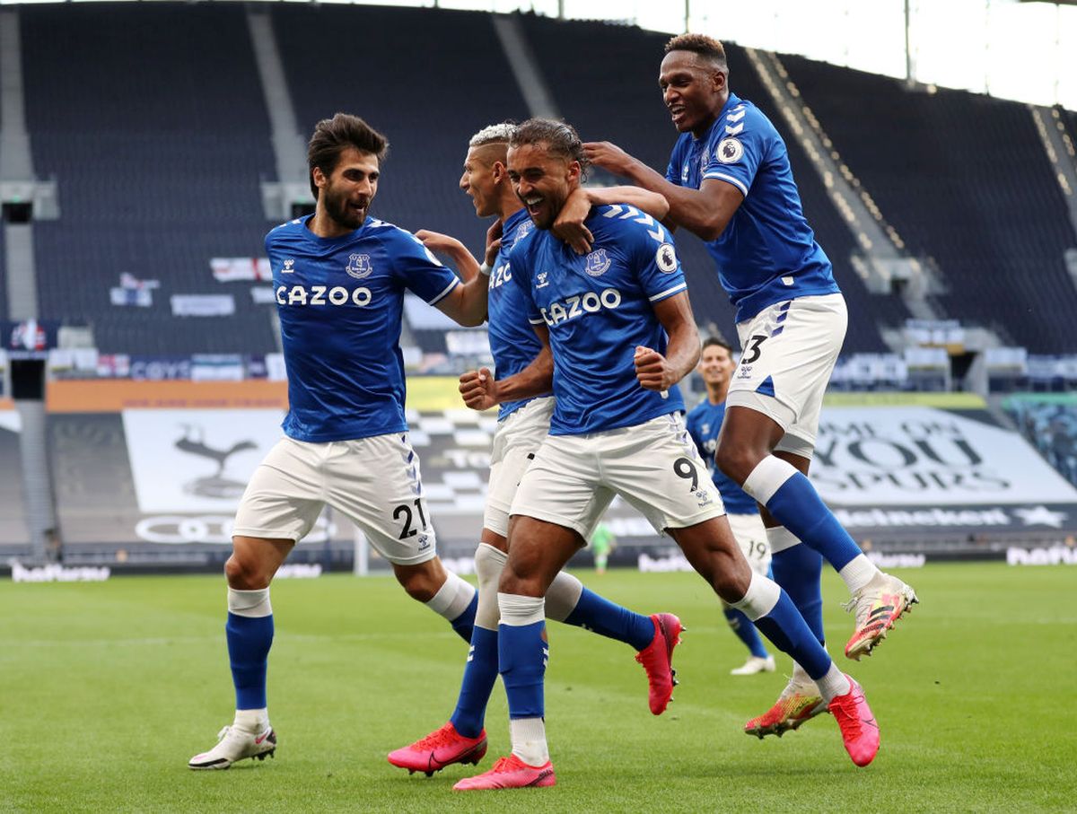 Everton's Dominic Calvert-Lewin celebrates with teammates Andre Gomes, Richarlison and Yerry Mina after scoring against Tottenham Hotspur at Tottenham Hotspur Stadium in London