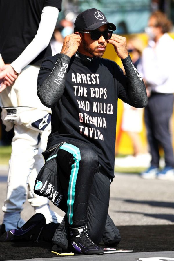 Mercedes GP's British driver Lewis Hamilton takes a knee on the grid in support of ending racism before the F1 Grand Prix of Tuscany at Mugello Circuit in Scarperia, Italy on Sunday