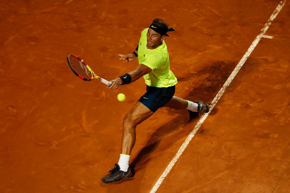 Spain's Rafael Nadal stretches to play a backhand in his second round match against compatriot Pablo Carreno Busta on day three of the Internazionali BNL d'Italia at Foro Italico in Rome on Wednesday