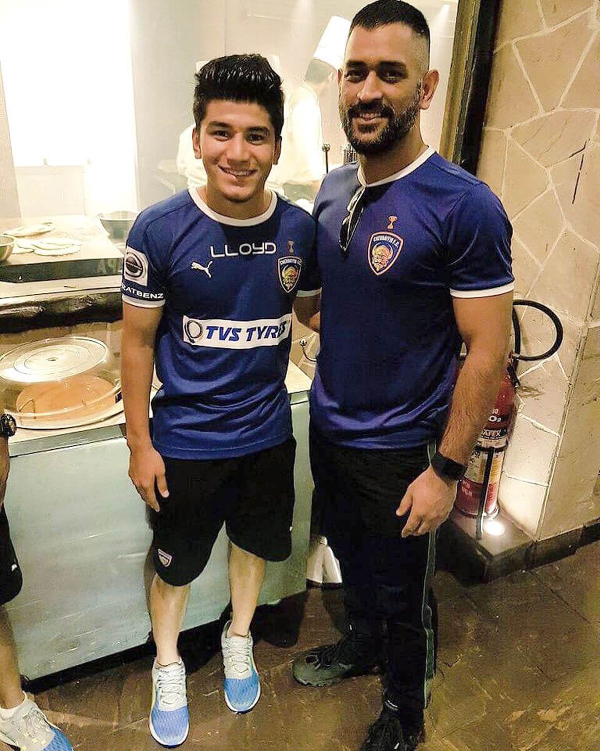 Anirudh Thapa and Mahendra Singh Dhoni