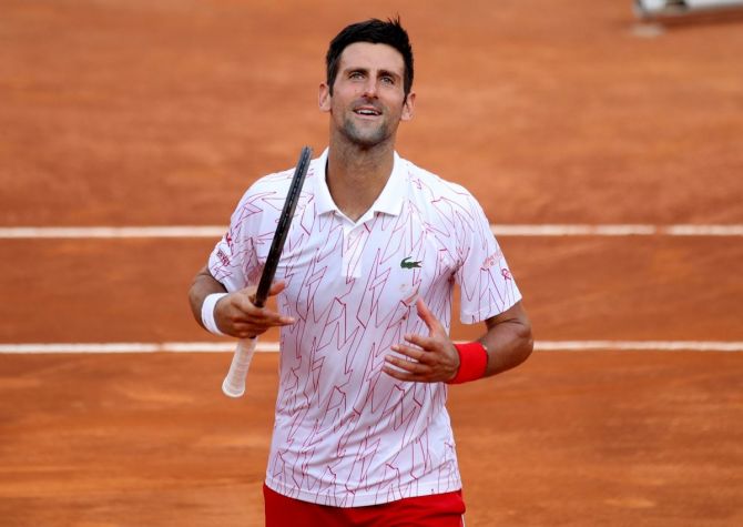 Serbia's Novak Djokovic celebrates after winning his semi-final against Norway's Casper Ruud on Sunday