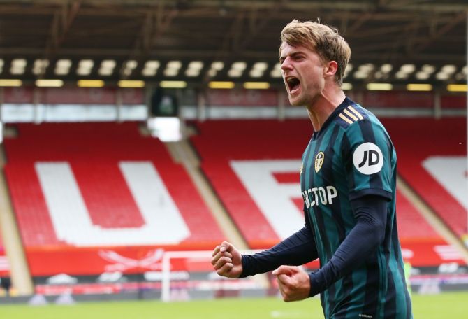 Patrick Bamford celebrates scoring for Leeds United in their Premier League match against Sheffield United.