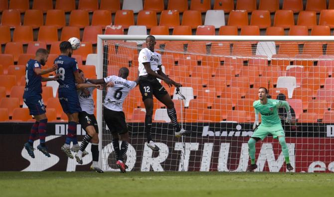 Dimitris Siovas scores for Huesca during the La Liga Santader match against Valencia, at Estadio Mestalla, in Valencia