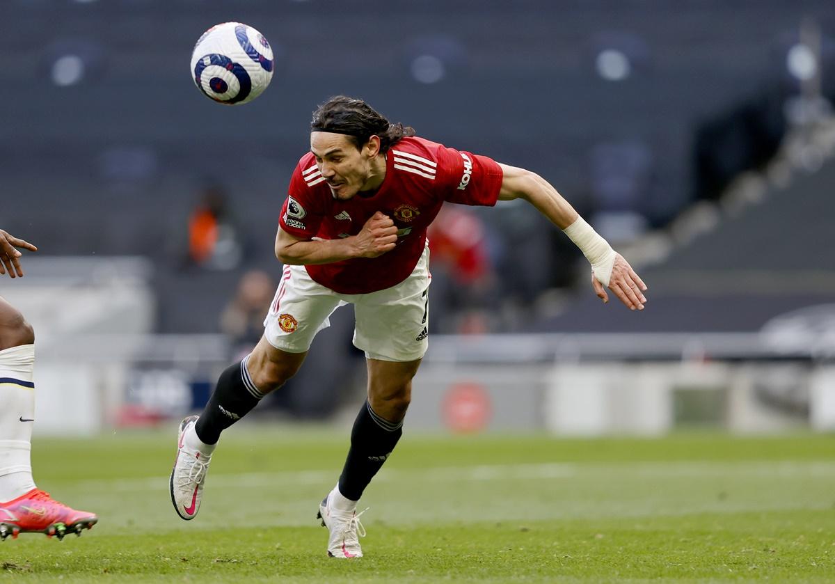 Edinson Cavani scores Manchester United's second goal during the Premier League match against Tottenham Hotspur, at Tottenham Hotspur stadium, Sunday. 