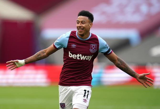 Jesse Lingard celebrates scoring West Ham United's opening goal during the Premier League match against Leicester City, at London Stadium, on Sunday.