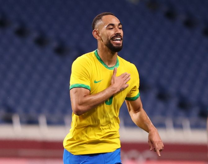 Matheus Cunha celebrates scoring Brazil's only goal against Egypt.