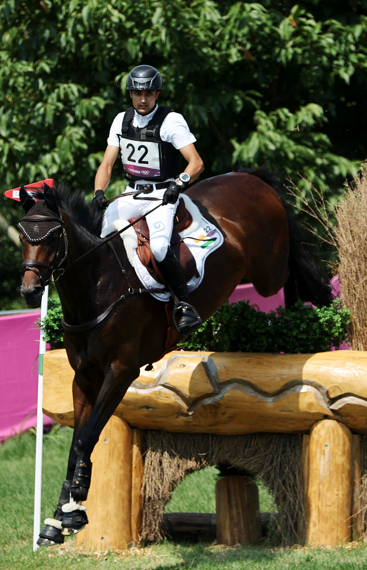 India's Fouaad Mirza and his horse Seigneur compete in the  Eventing Cross Country Individual final on Sunday