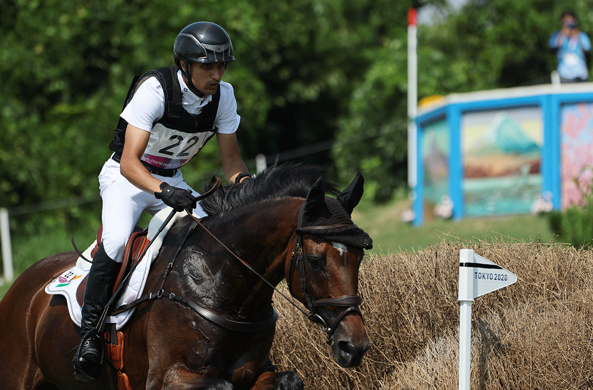India's Fouaad Hyder Mirza on his horse Seigneur compete in the Eventing Cross Country Individual Equestrian  final at the Sea Forest XC Course in Tokyo at the Tokyo Olympics on Sunday