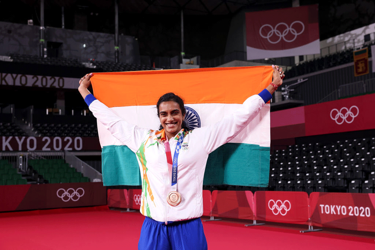 A beaming PV Sindhu with the tri-colour after winning the bronze medal at the Tokyo Olympics on Sunday