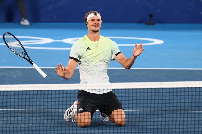 Germany's Alexander Zverev reacts after winning his Olympics gold medal match against Karen Khachanov of the Russian Olympic Committee