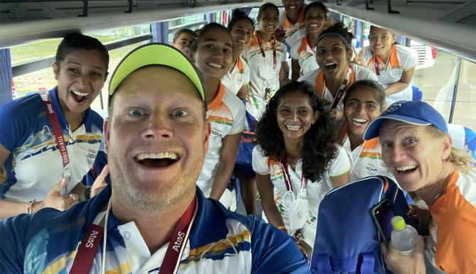 Indian women's hockey coach Sjoerd Marijne celebrates with the players