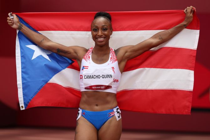 Puerto Rico's Jasmine Camacho-Quinn celebrates winning the gold medal in the Olympics women's 100 metres hurdles, at Olympic Stadium in Tokyo, on Monday.