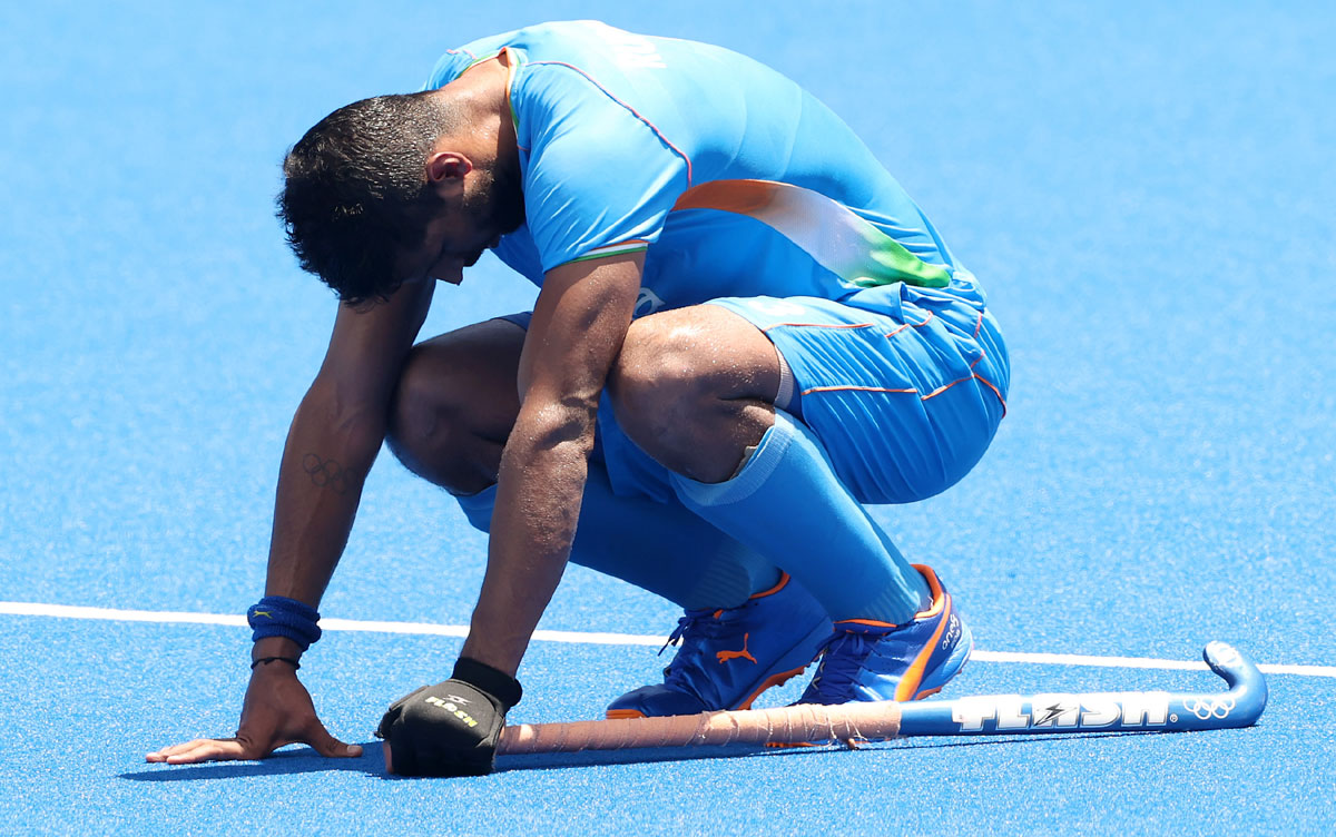 Rupinder Pal Singh reacts atthe end of the match.