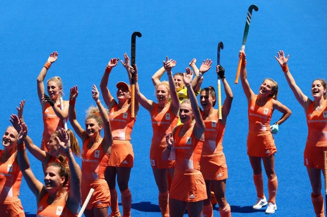 The Netherlands players celebrate after beating Great Britain and entering the Olympics women's hockey final, at Oi Hockey Stadium in Tokyo, on Wednesday.