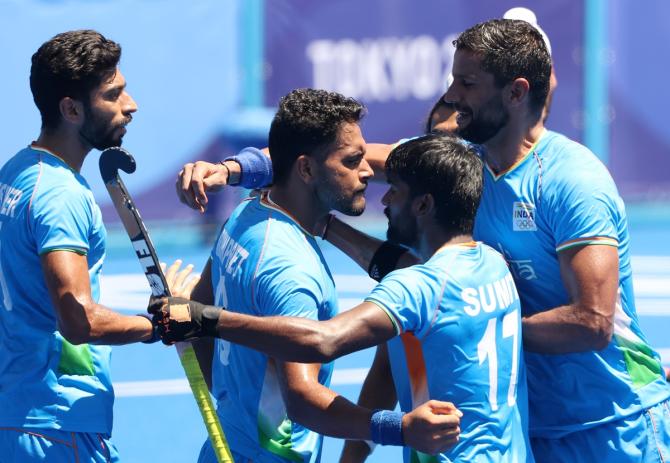 Harmanpreet Singh celebrates scoring India's third goal with teammates during the Olympics men's hockey bronze medal match against Germany, at Oi Hockey Stadium in Tokyo, on Thursday.