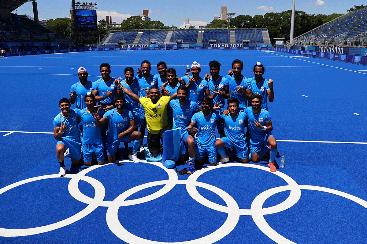 The Indian Hockey Team pose for a picture after winning the Men's Bronze medal match of the Tokyo 2020 Olympic Games