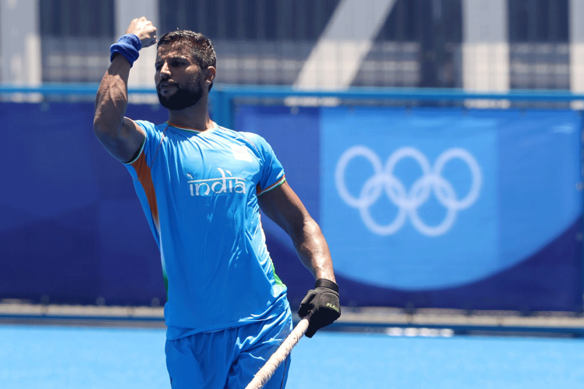 Rupinder Pal Singh celebrates on converting a penalty corner