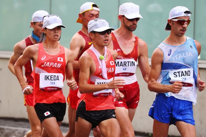 Gold medallist Massimo Stano of Italy and Japan's silver and bronze medallists Koki Ikeda and Toshikazu Yamanishi battle it out for supremacy in the Olympics men's 20km Walk, on Thursday.