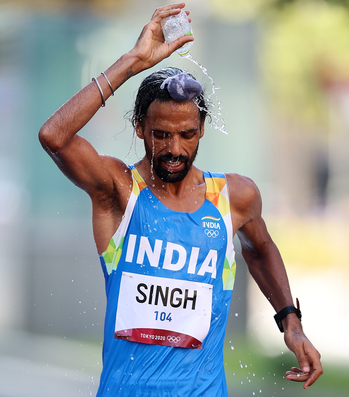 India's Gurpreet Singh competes in the Olympics men's 50km Race Walk final, at Sapporo Odori Park in Sapporo, Japan, on Thursday.