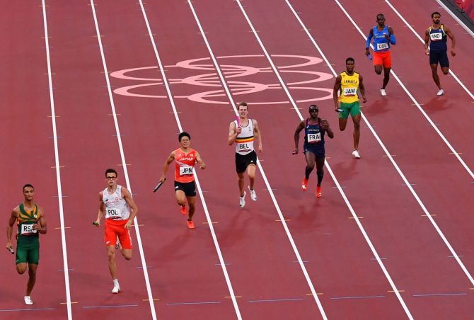 India's Amoj Jacob, far right, runs the last leg in the Olympics men's 4 x 400m Relay Heat 2, at Olympic Stadium, in Tokyo, on Friday.