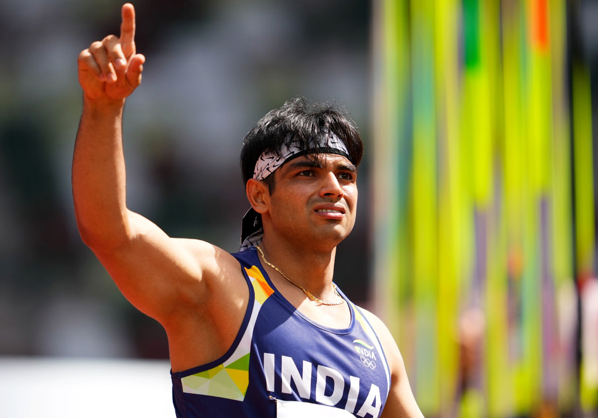 Neeraj Chopra reacts after his first throw in the Olympics men's Javelin Throw competition