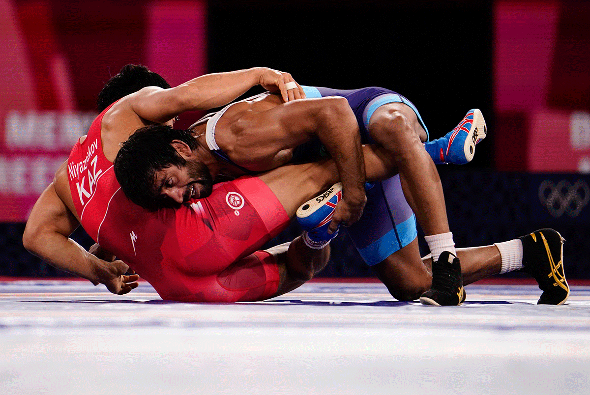 India's Bajrang Punia competes against Kazakhstan's Daulet Niyazbekov in their men's freestyle 65kg bronze medal match at the Tokyo 2020 Olympic Summer Games on Saturday