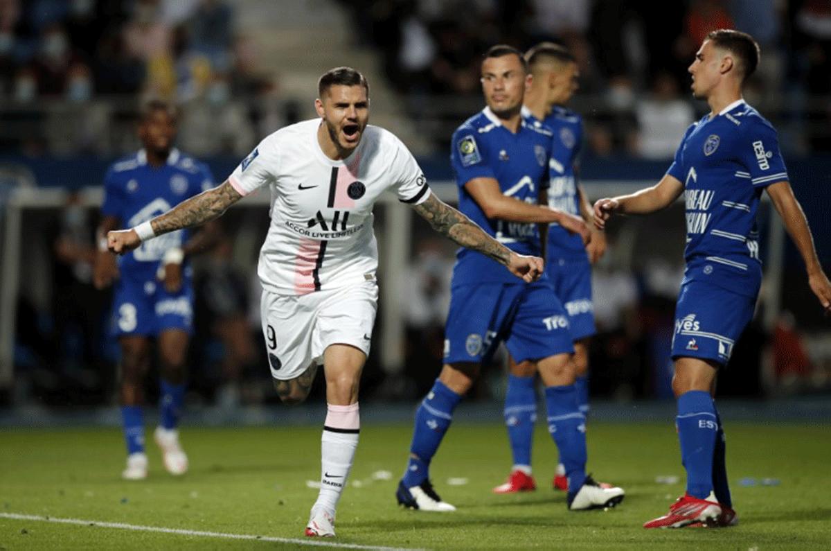 Paris St Germain's Mauro Icardi celebrates scoring their second goal against Troyes in their Ligue 1 match at Stade de l'Aube, Troyes, France, on Saturday