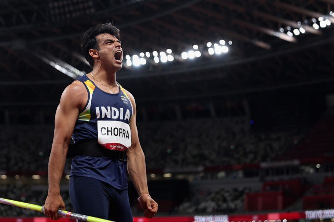 India's Neeraj Chopra reacts after returning from one of his attempts in the Olympics men's Javelin Throw final, at Olympic Stadium in Tokyo, on Saturday.