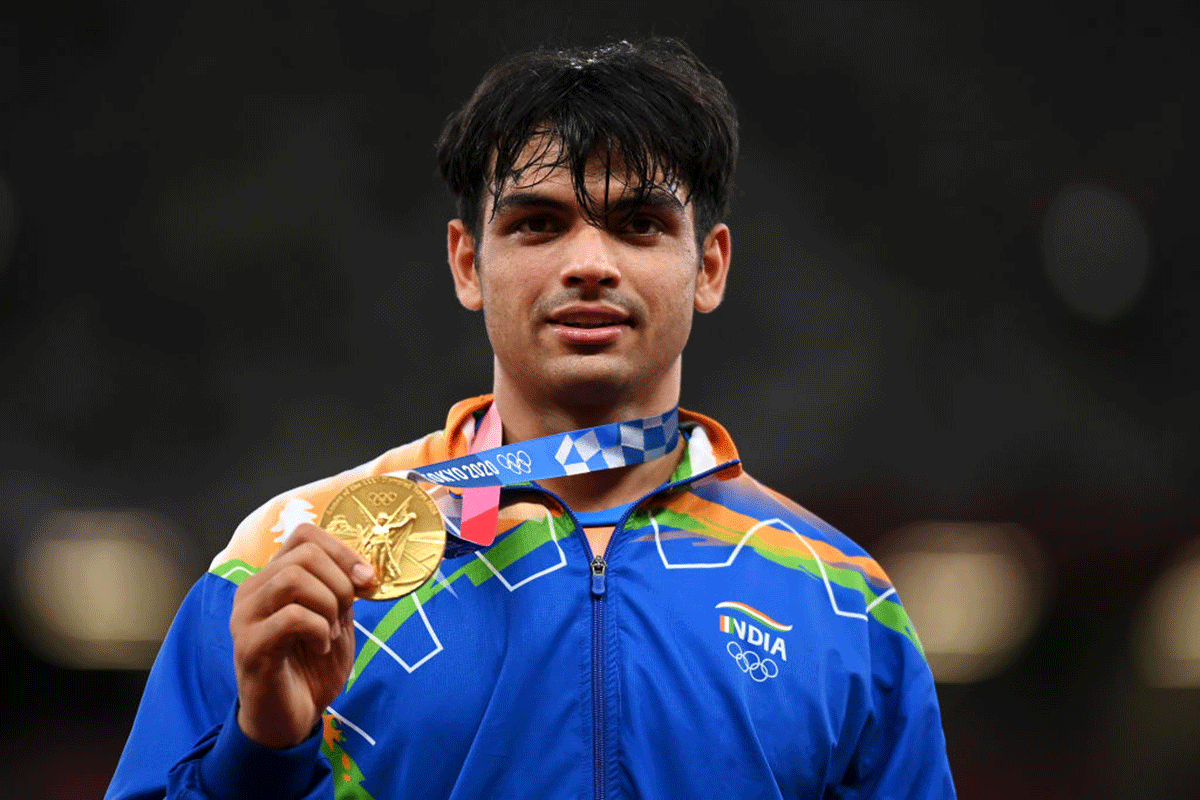 India's gold medallist Neeraj Chopra on the podium during the medals ceremony for the men's Javelin Throw of the at Olympic Stadium on in Tokyo on Saturday  