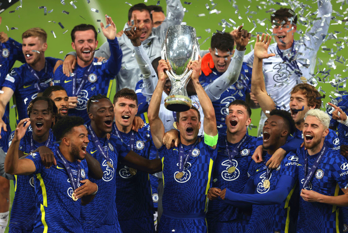 Chelsea's Cesar Azpilicueta lifts the UEFA Super Cup Trophy after defeating Villarreal CF at the National Football Stadium at Windsor Park in Belfast, on Wednesday