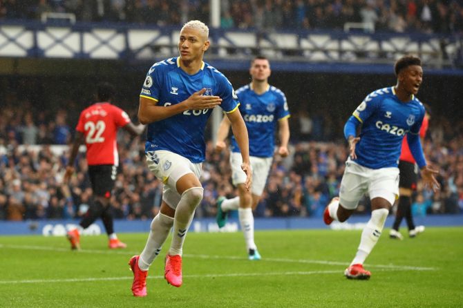 Richarlison celebrates after scoring Everton's first goal against Southampton, at Goodison Park in Liverpool, on Saturday.