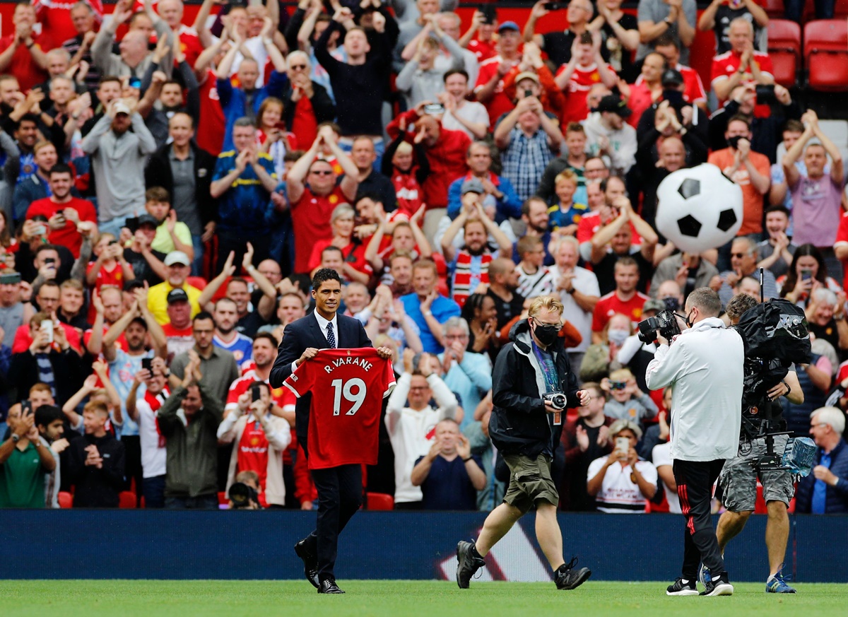 Raphael Varane is presented to fans before Manchester United's Premier League match against Leeds United, at Old Trafford, on Saturday.
