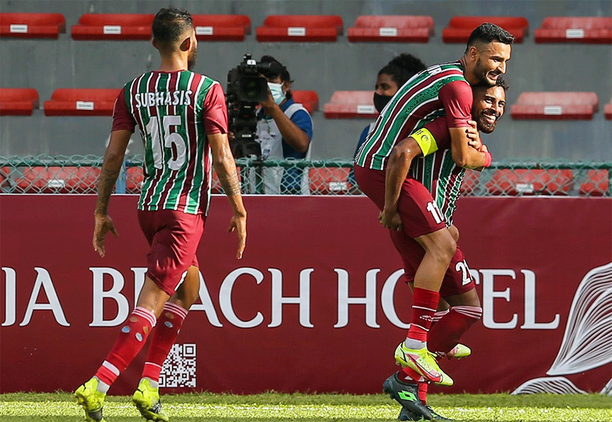 ATK Mohun Bagan's Manvir Singh celebrates with Roy Krishna after the latter struck the opening goal against Bengaluru FC in their AFC Cup match in Male on Wednesday