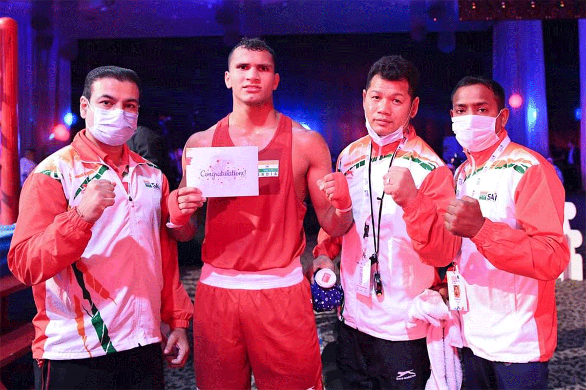 India's Deepak celebrates after winning his bout to reach the semi-final of the ASBC Youth and Junior Boxing Championship in Dubai on Sunday 