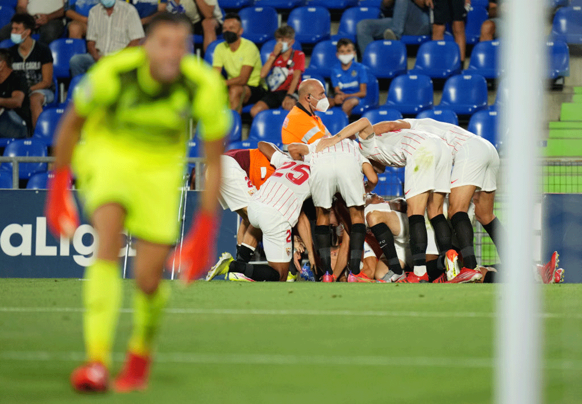 Sevilla's Erik Lamela celebrates after scoring their team's first goal against Getafe CF during their LaLiga match at Coliseum Alfonso Perez in Getafe on Tuesday