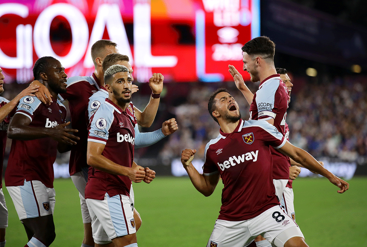 West Ham United's Pablo Fornals celebrates scoring their first goal with teammates against Leicester City at London Stadium in London on Monday