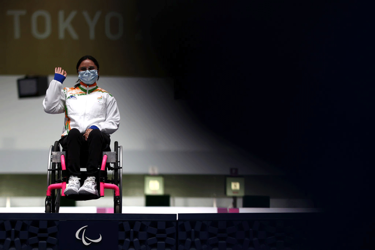 India's Avani Lekhara poses with her gold medal after winning the R-2 women's 10m Air Rifle Standing SH1 event at the Paralympic Games in Tokyo